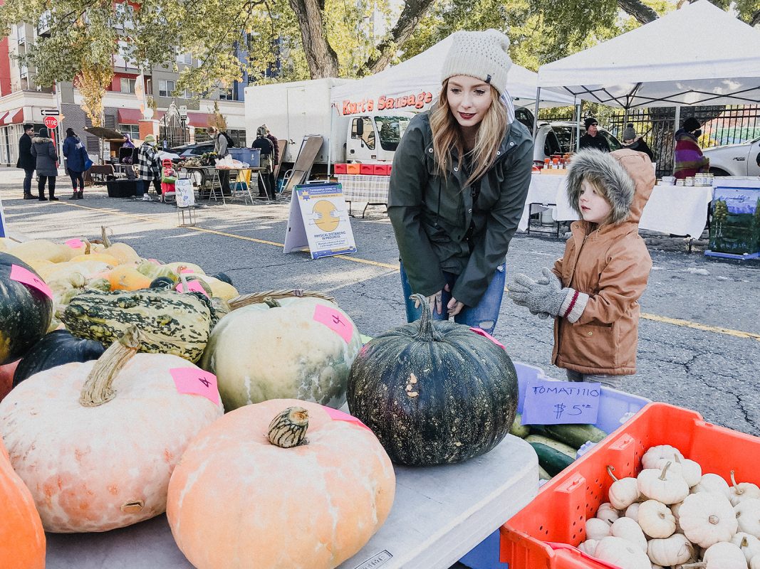 Skyleigh McCallum and her daughter bundled up looking at pumpkins at the Kamloops Farmers Market.