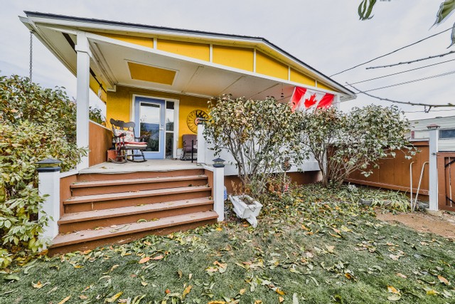 A cute yellow home recently sold by Skyleigh McCallum Realtor in Kamloops, BC.