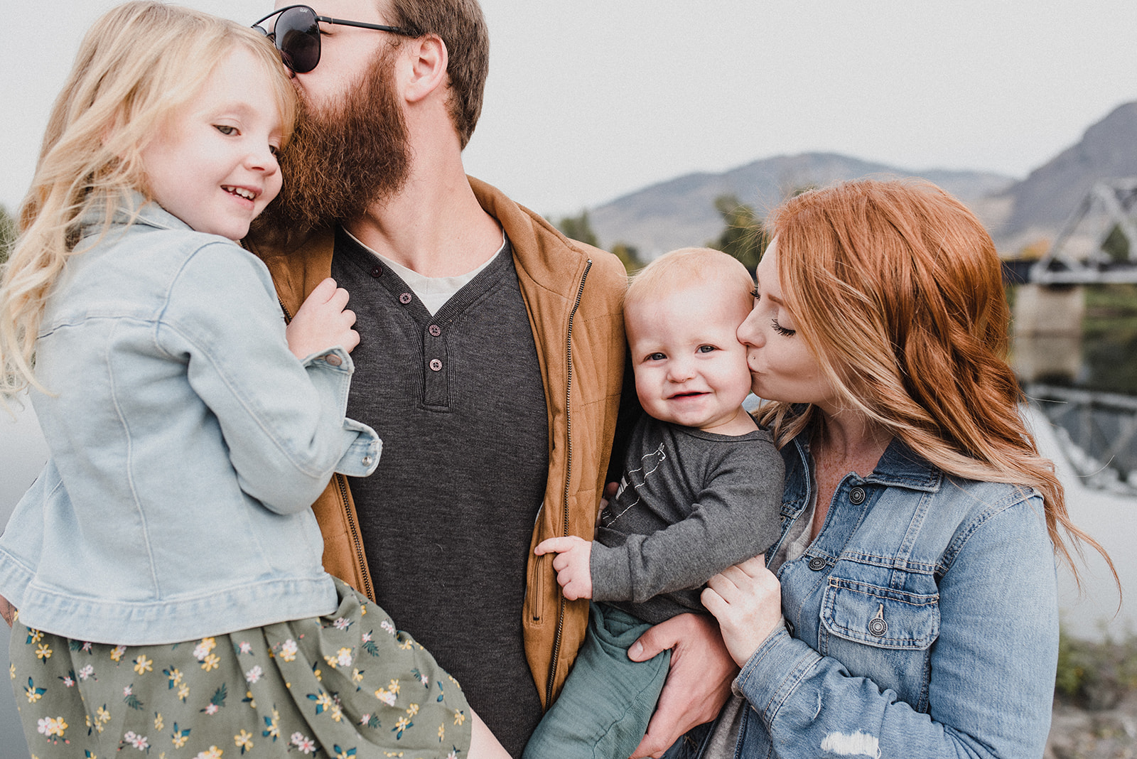 Skyleigh McCallum hugs her family during a photoshoot in downtown Kamloops. 