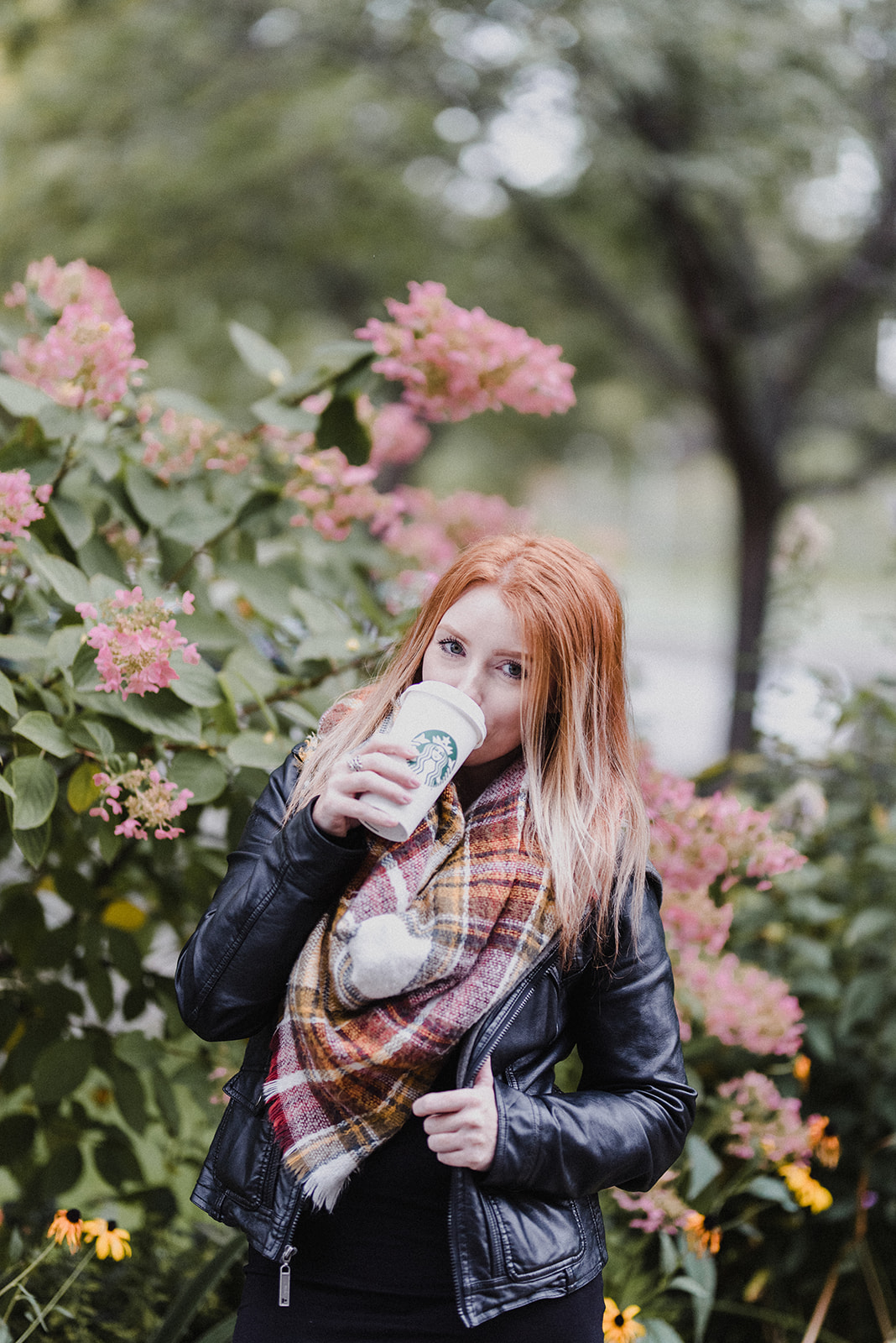 Skyleigh sipping a pumpkin spice latte to embrace fall in Kamloops